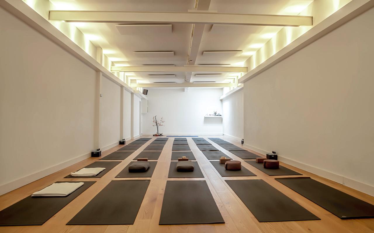 Yoga studio in Delft with serene yoga class setting by the canal